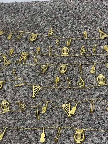 Gold tone 4pc instrument - gold,